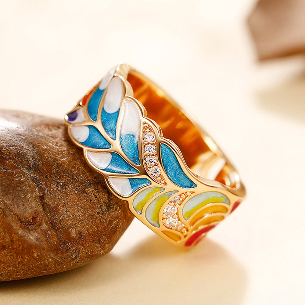 Margaux – Ring with Gold Motif and Blue-White Design