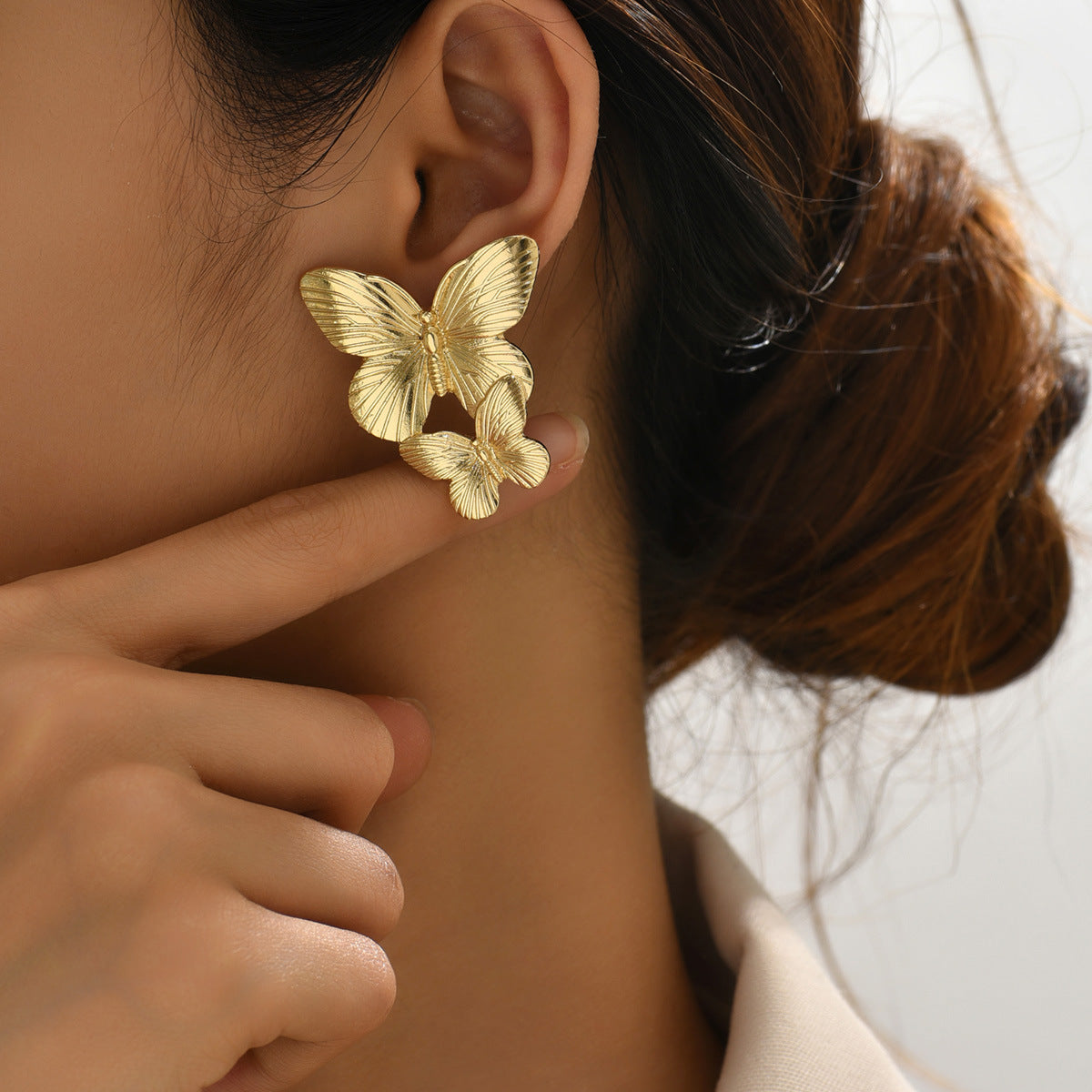 Mariah - Gold Earrings with Butterfly Design