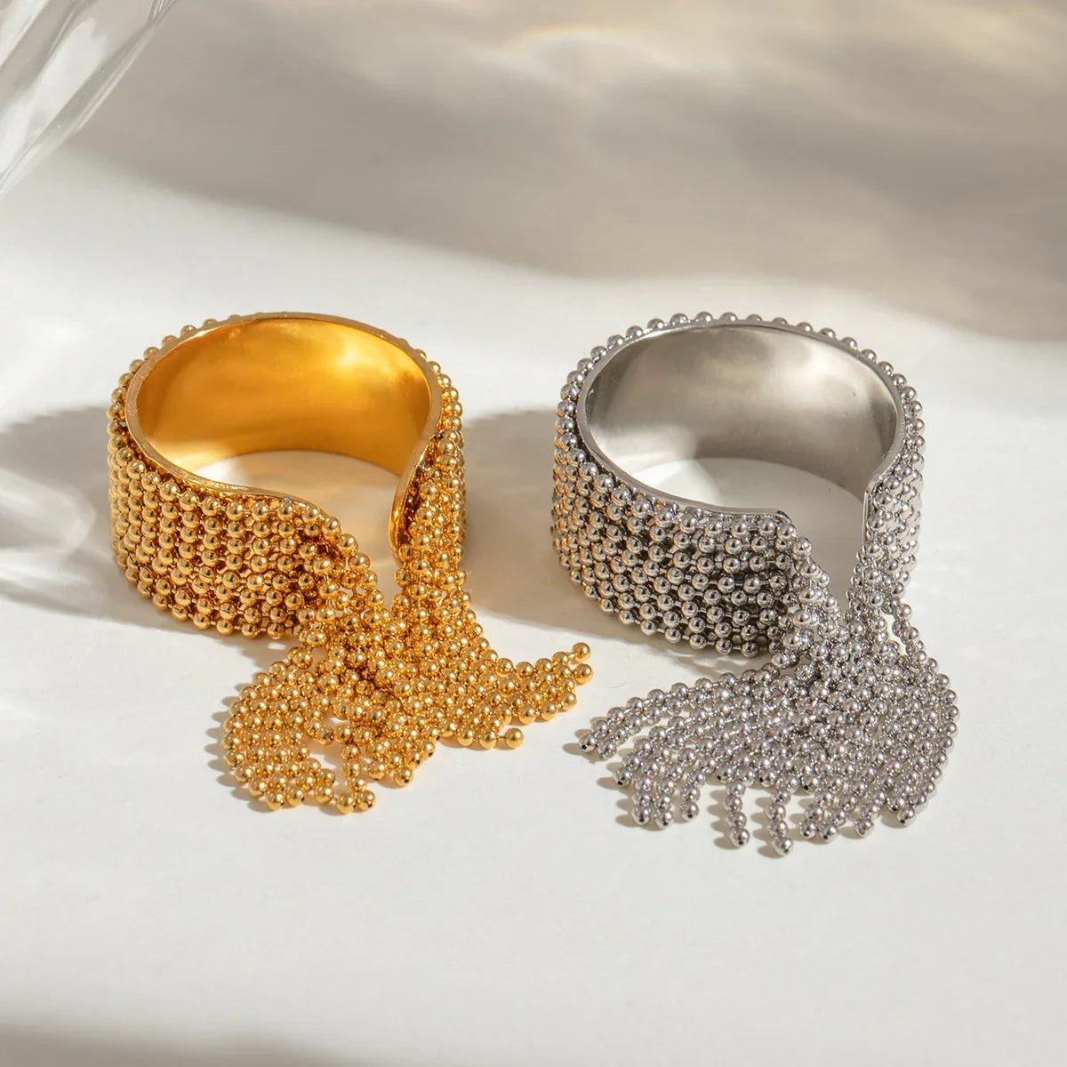 Women's Adjustable Statement Ring with Tassel Design and Multi-Row Chain Details