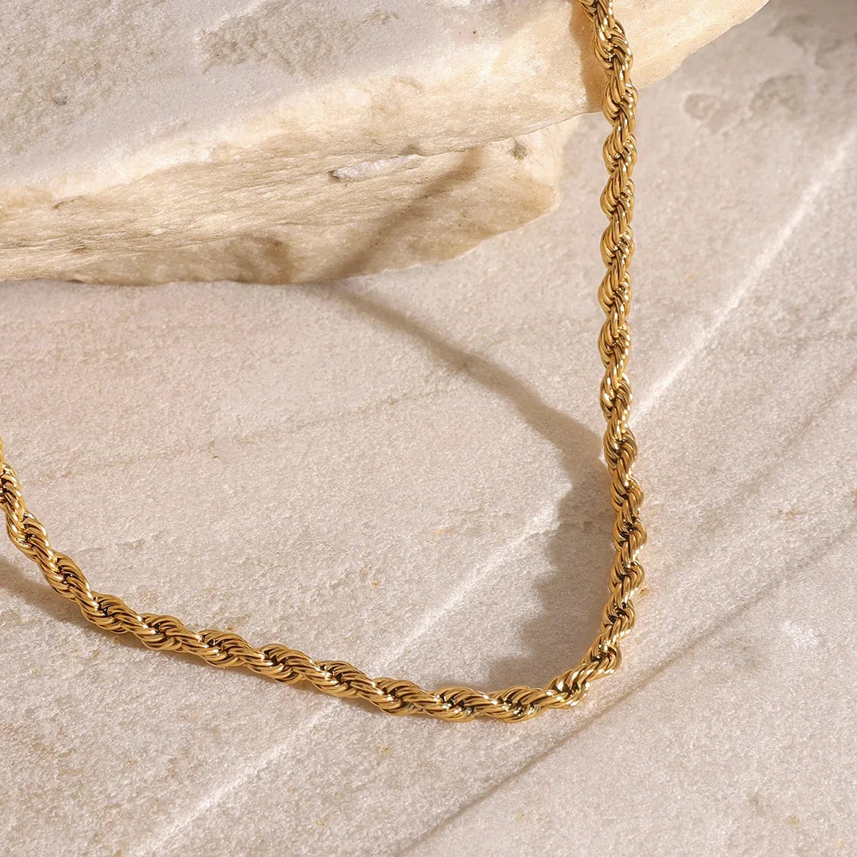 Women's Multilayered Necklace with Three Fine Chains and Stone Accents