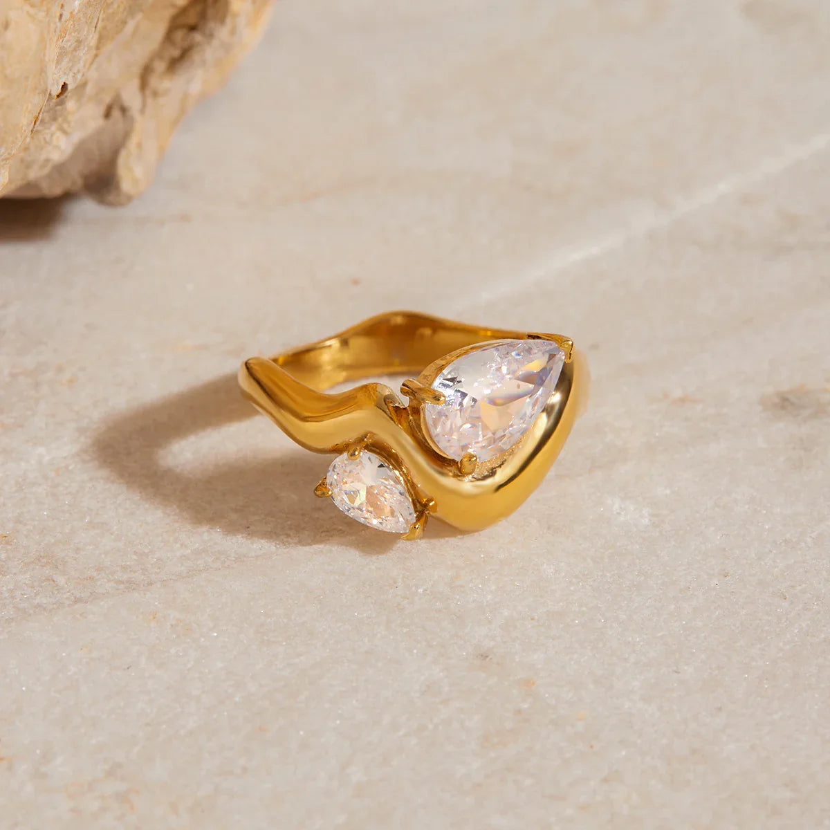 Women's Statement Ring with Two Teardrop-Shaped Stones and Curved Band