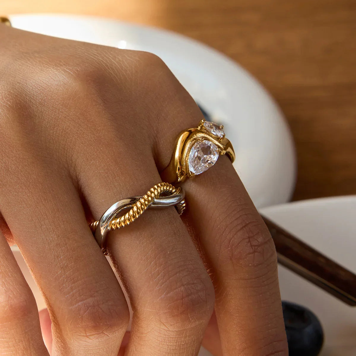 Women's Statement Ring with Two Teardrop-Shaped Stones and Curved Band