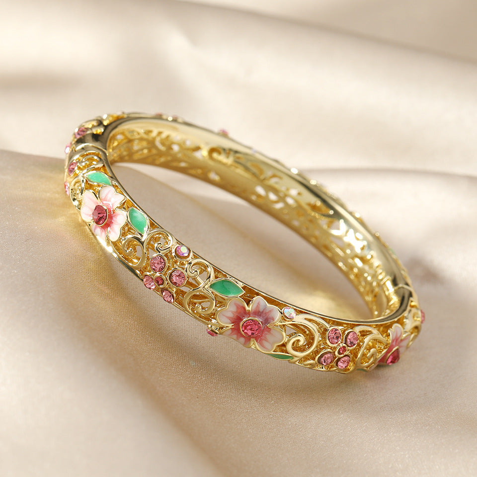 Women's Open Flower Bracelet with Enamel Details and Stone Accents