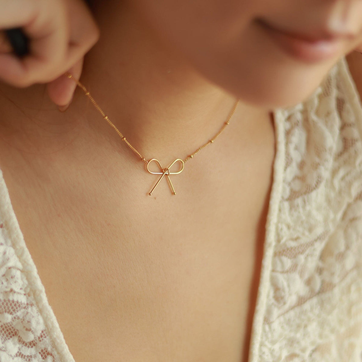Women's Bow Necklace with Delicate Pendant and Extension Chain