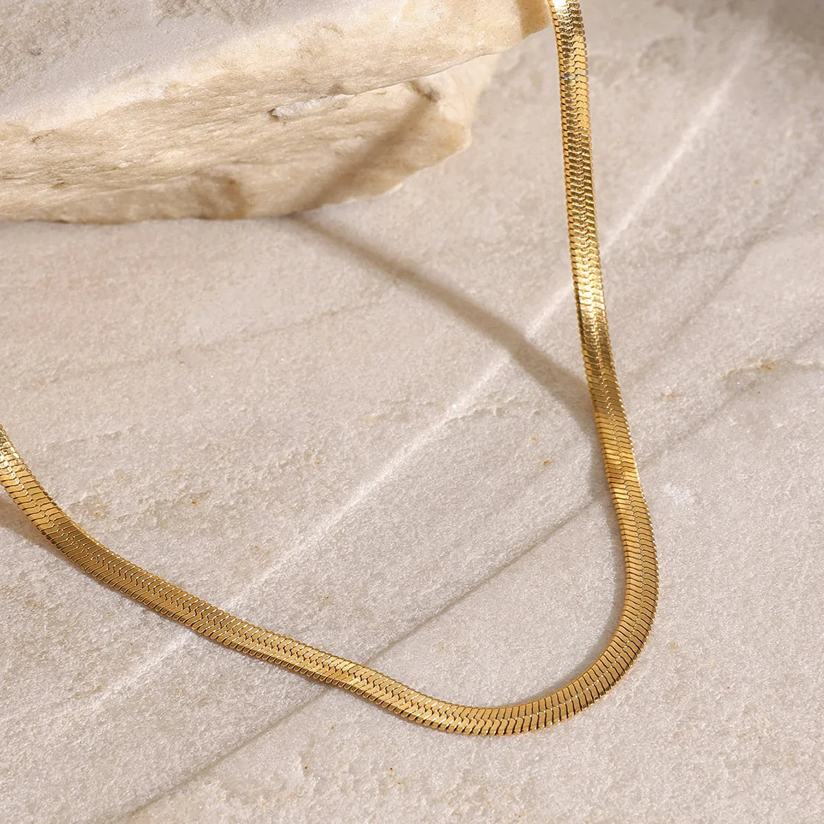 Women's Multilayered Necklace with Three Fine Chains and Stone Accents