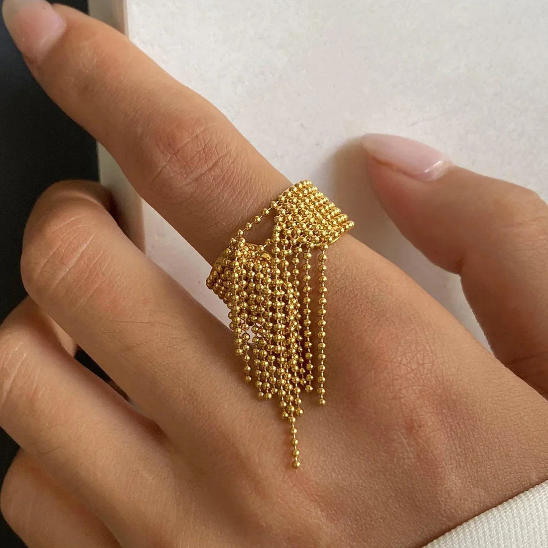 Women's Adjustable Statement Ring with Tassel Design and Multi-Row Chain Details