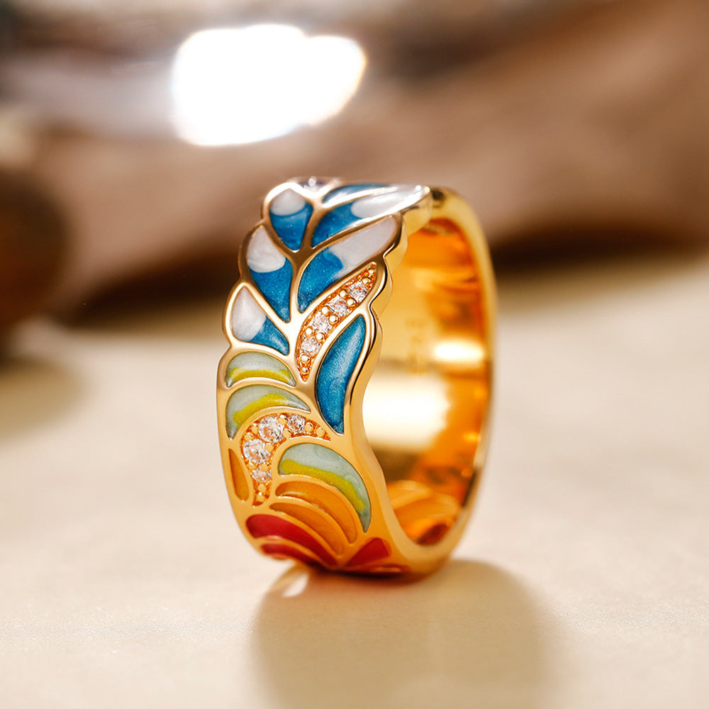 Margaux – Ring with Gold Motif and Blue-White Design