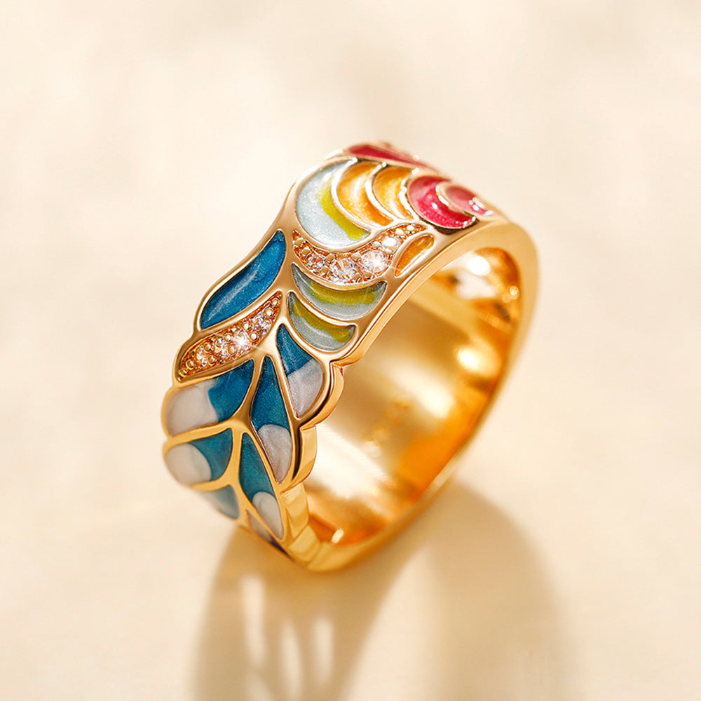 Margaux – Ring with Gold Motif and Blue-White Design