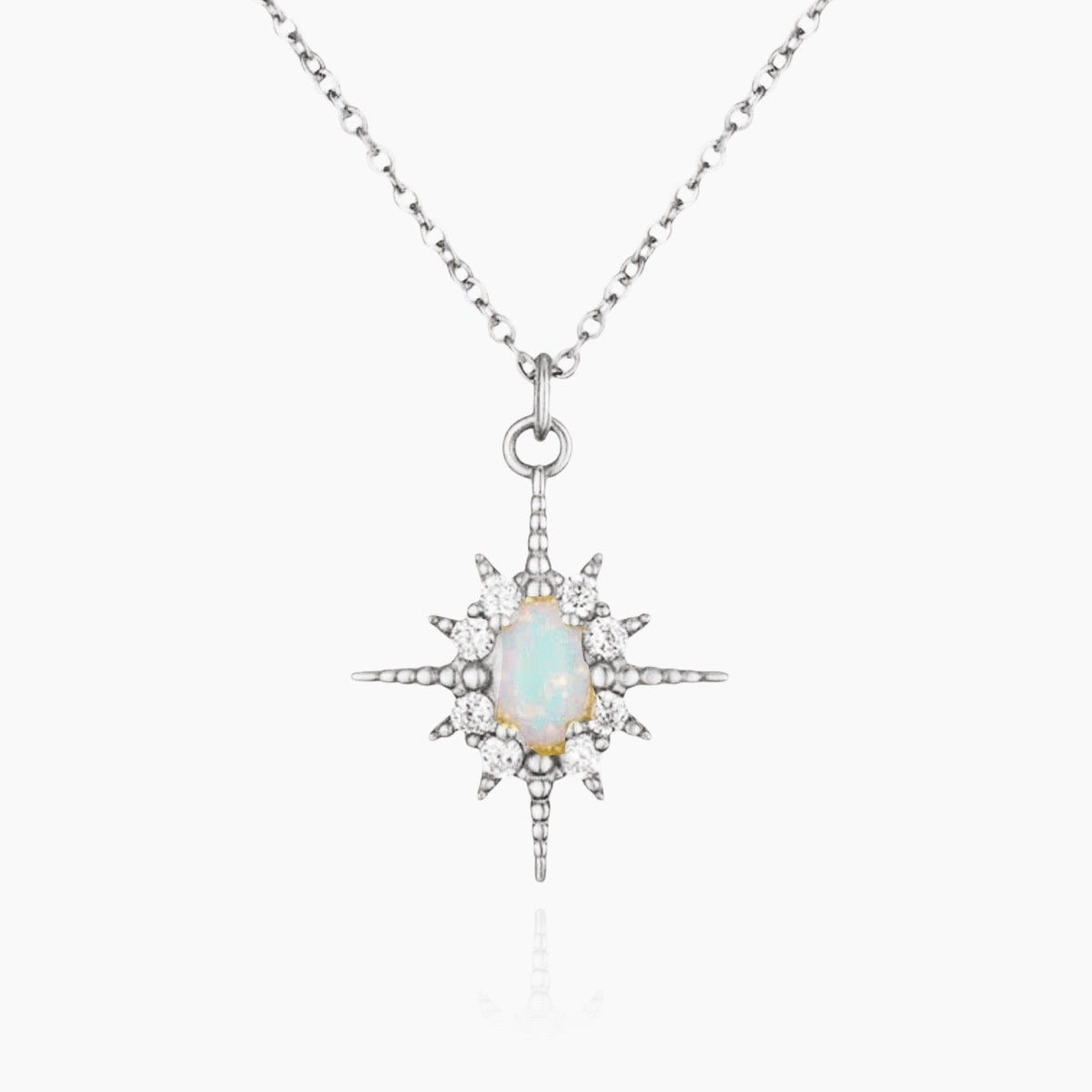 Women's Pendant Necklace with Oval Center Stone and Star Ray Design