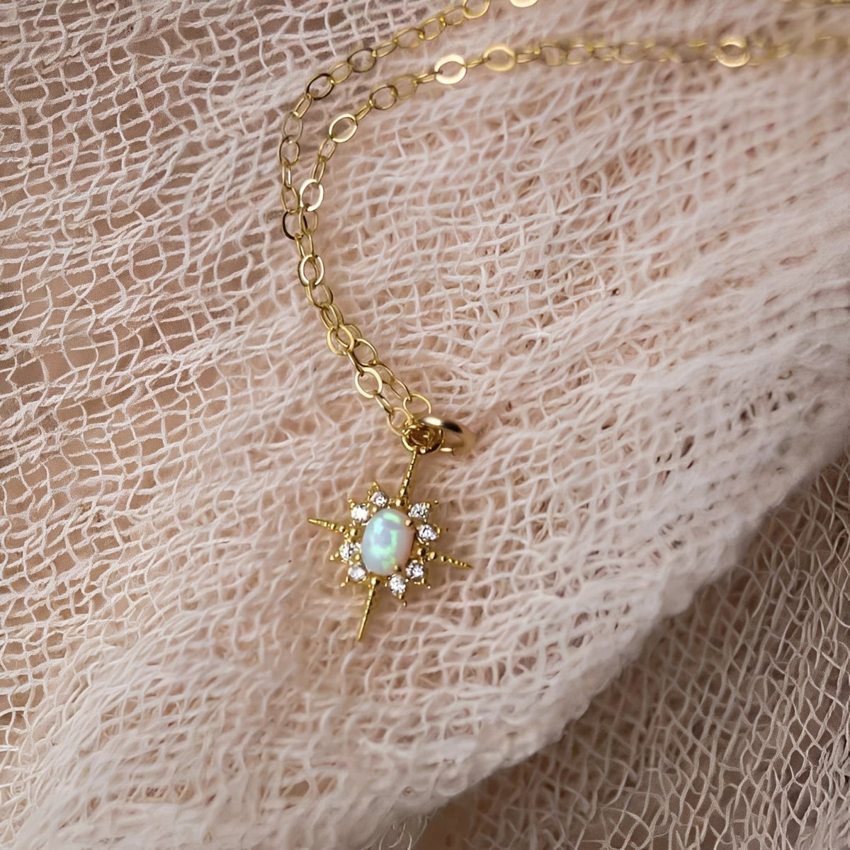 Women's Pendant Necklace with Oval Center Stone and Star Ray Design