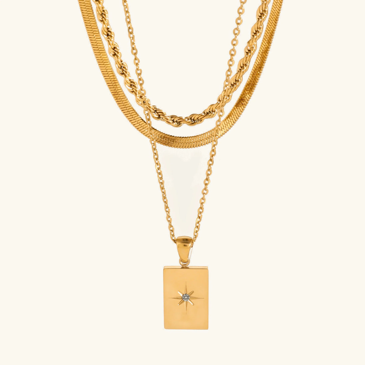 Women's Multilayered Necklace with Three Fine Chains and Stone Accents