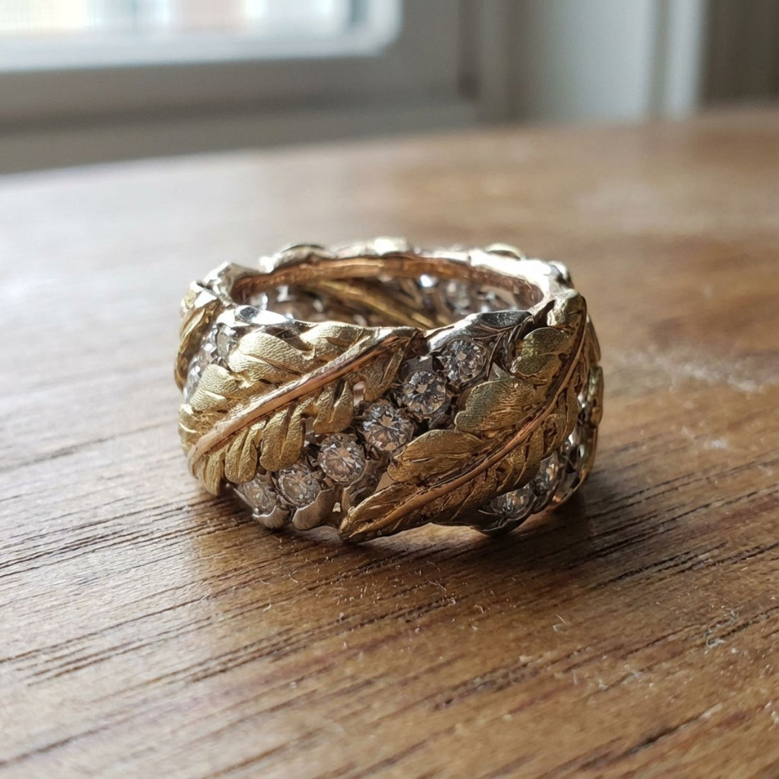 Women’s Wide Ring with Leaf Relief and Multiple Row Stone Accents