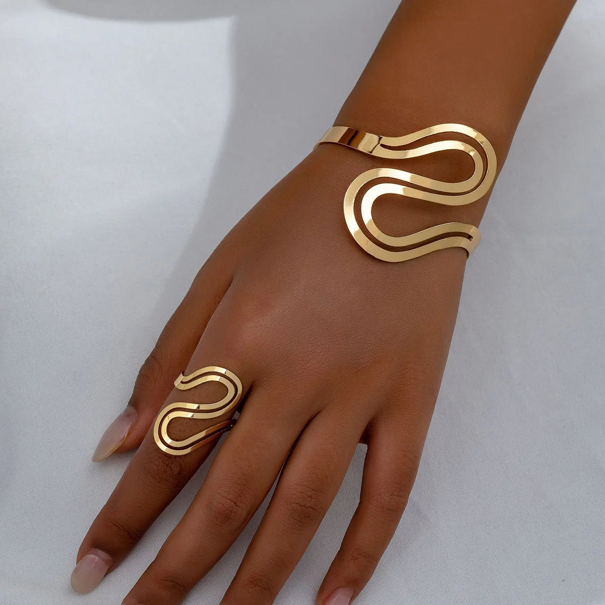 Women's Adjustable Bracelet and Ring Set with Modern Swirled Design