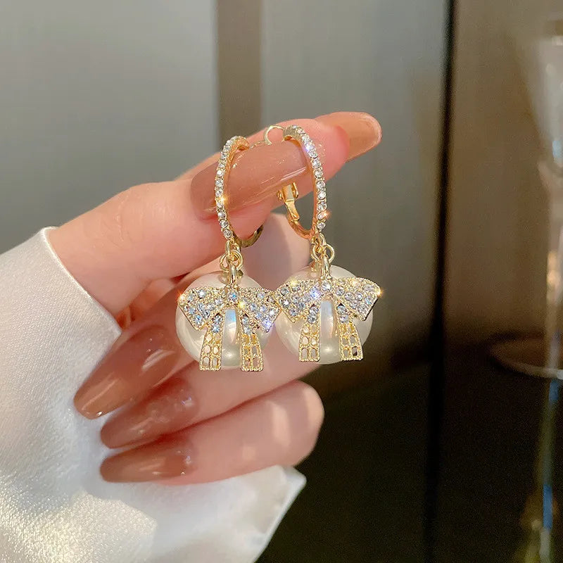 Women’s Earrings with Christmas Ball Motif, Bow and Stone Accents
