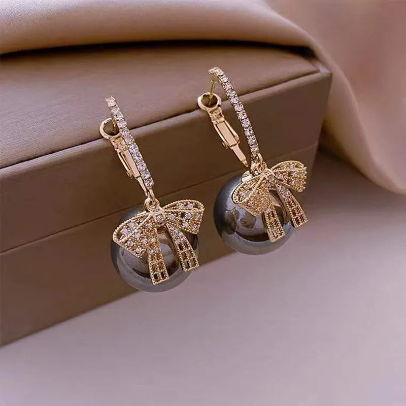 Women’s Earrings with Christmas Ball Motif, Bow and Stone Accents