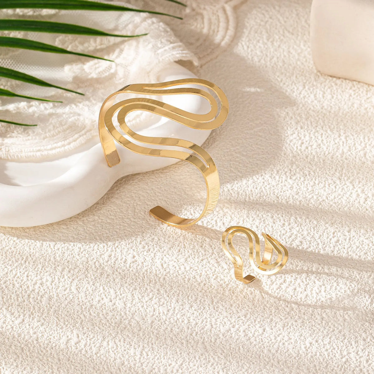 Women's Adjustable Bracelet and Ring Set with Modern Swirled Design