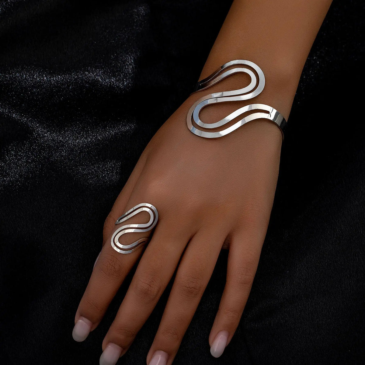 Women's Adjustable Bracelet and Ring Set with Modern Swirled Design