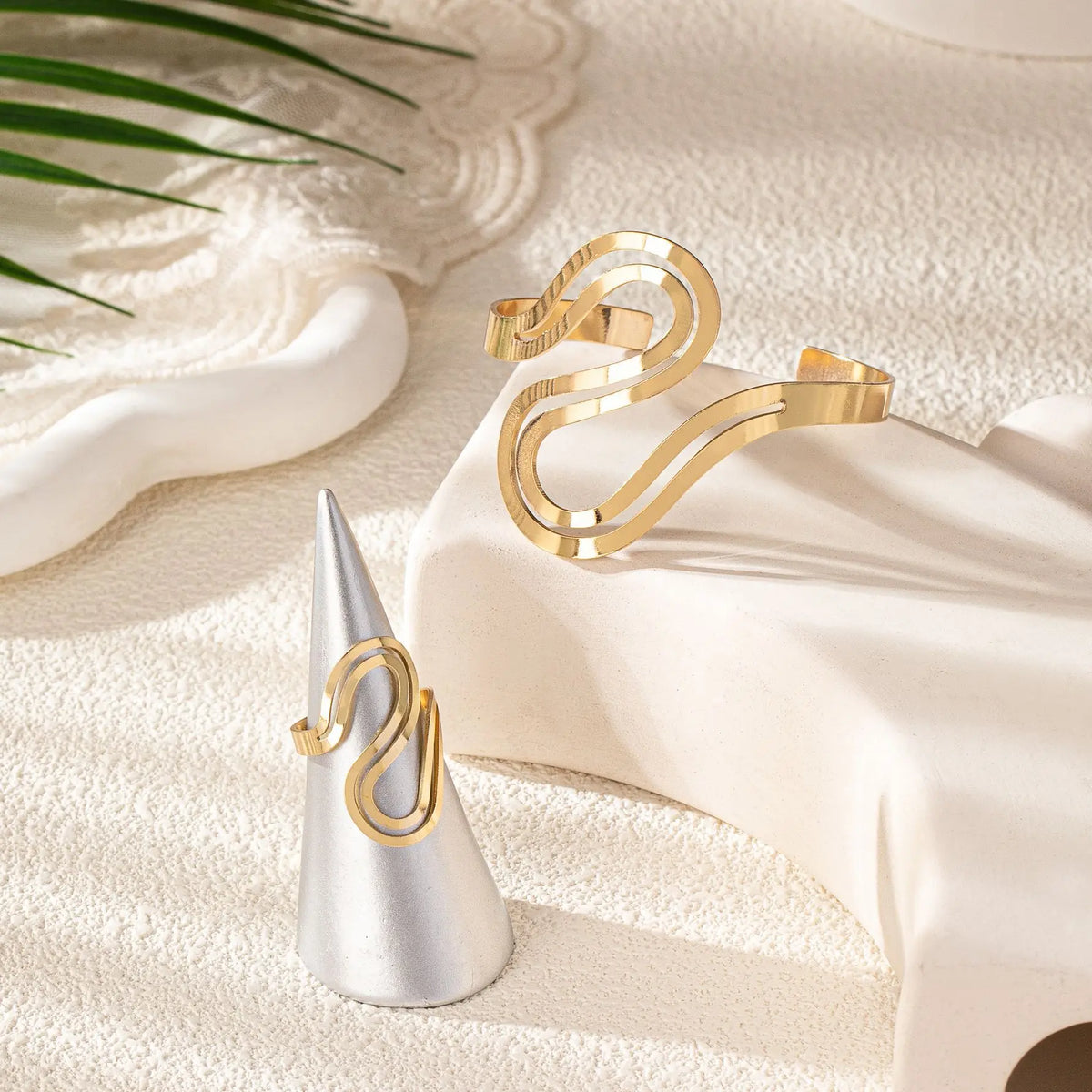 Women's Adjustable Bracelet and Ring Set with Modern Swirled Design