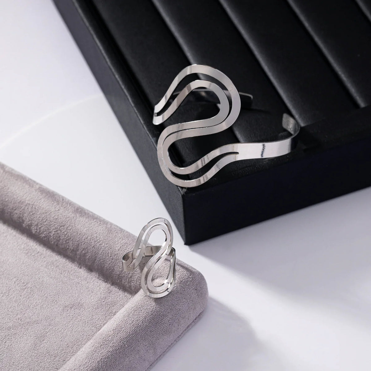 Women's Adjustable Bracelet and Ring Set with Modern Swirled Design