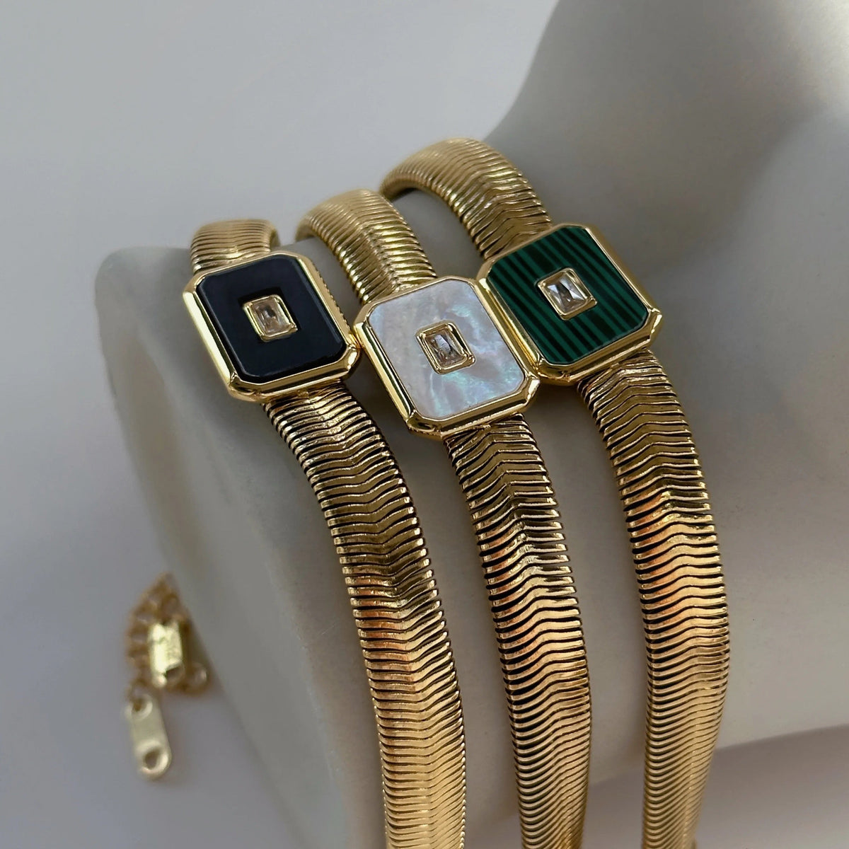 Women’s Bracelet with Square Center Piece and Central Stone Accent