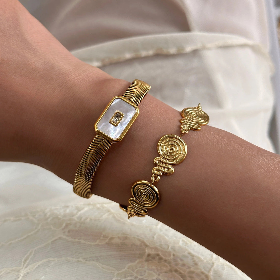 Women’s Bracelet with Square Center Piece and Central Stone Accent