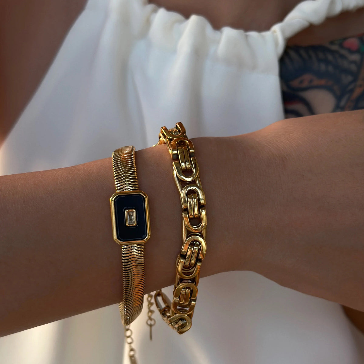 Women’s Bracelet with Square Center Piece and Central Stone Accent