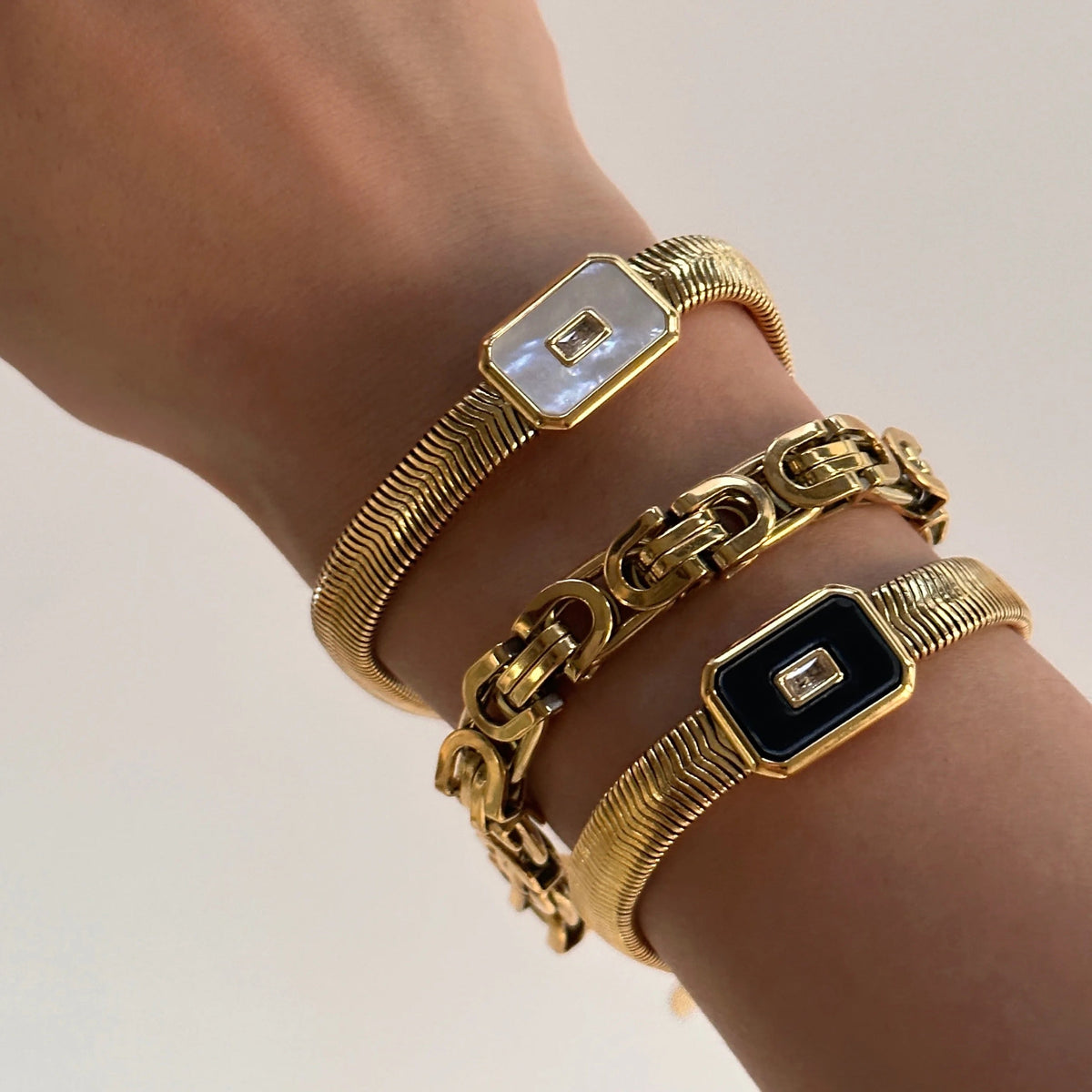 Women’s Bracelet with Square Center Piece and Central Stone Accent