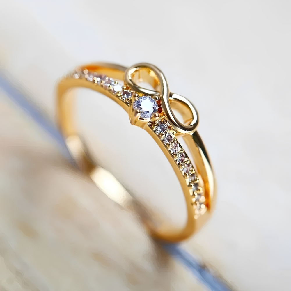 Women's ring with infinity symbol and faceted accents
