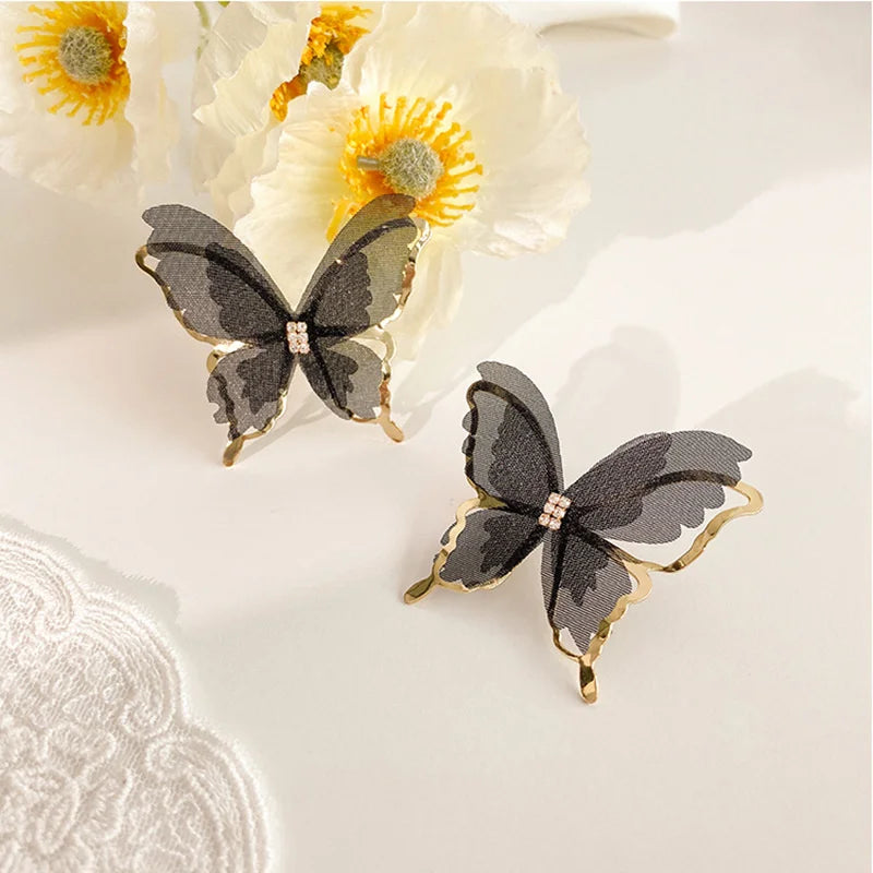 Jean – Butterfly Earrings made of Light Weave