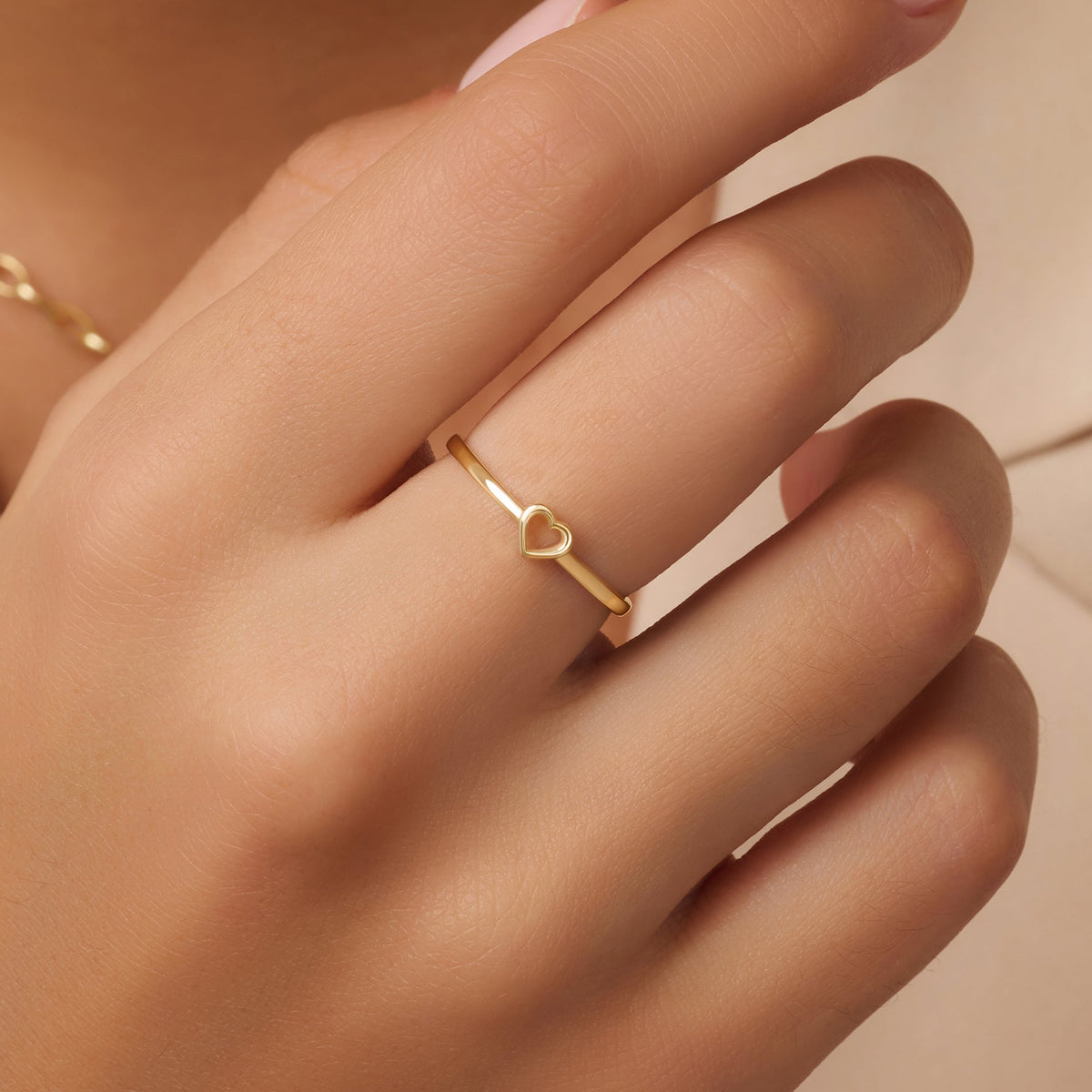 Women’s Ring with Open Heart Motif and Slim Band