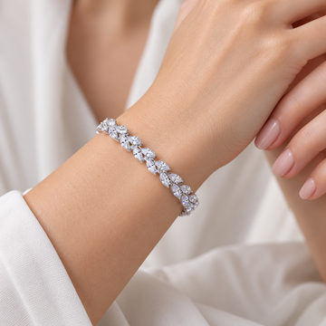 Women’s Tennis Bracelet with Leaf-Shaped Design and Sparkling Stone Accents