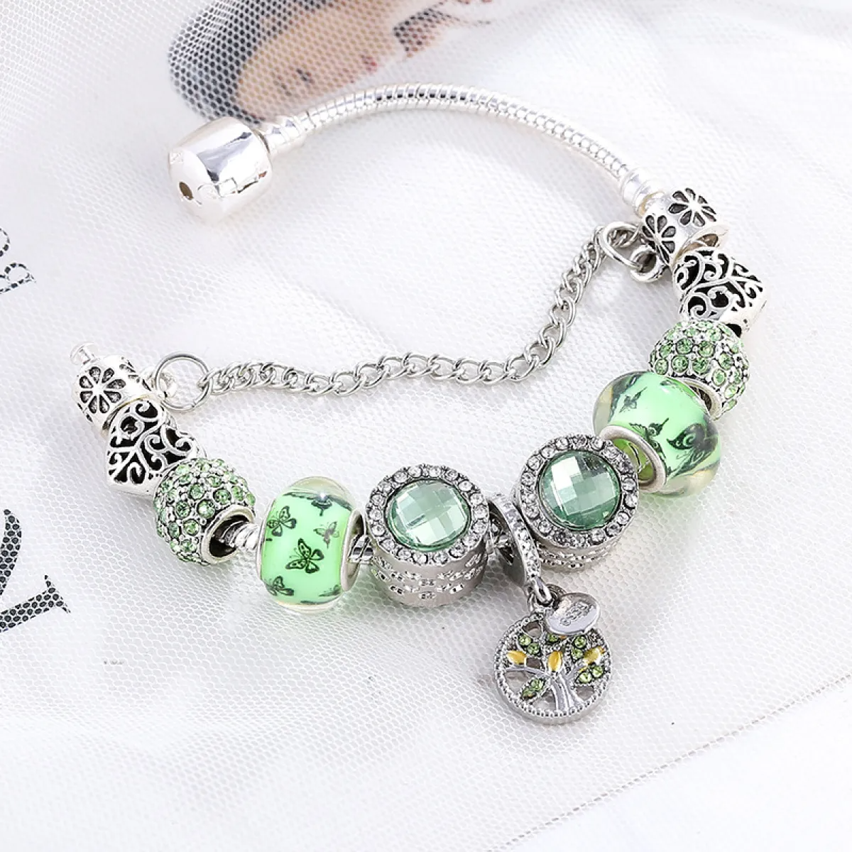 Women’s Charm Bracelet with Floral Motifs and Multiple Decorative Elements