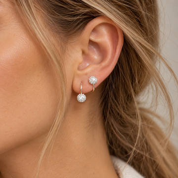 Women’s Double Ear Studs with Structured Round Elements and Curved Connecting Bridge