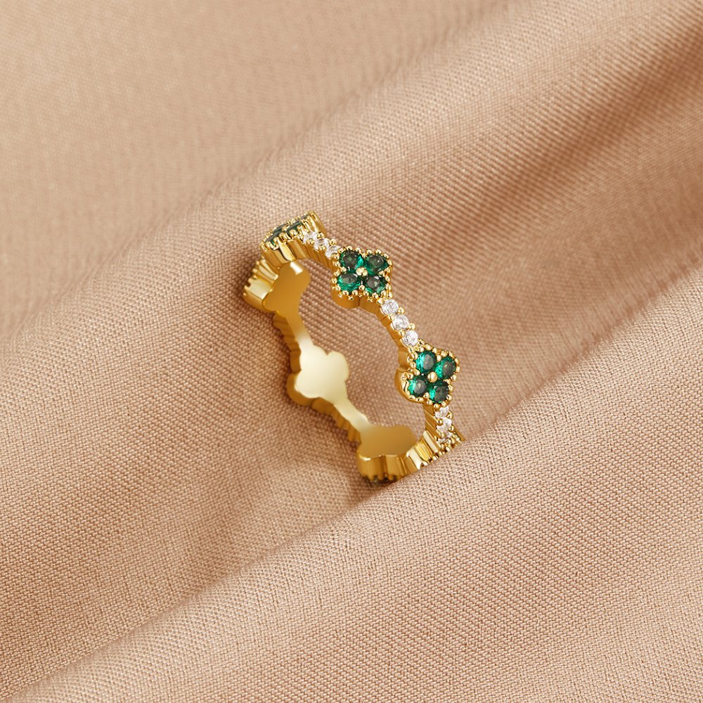 Women’s Ring with Floral Stone Clusters and Round Stone Setting
