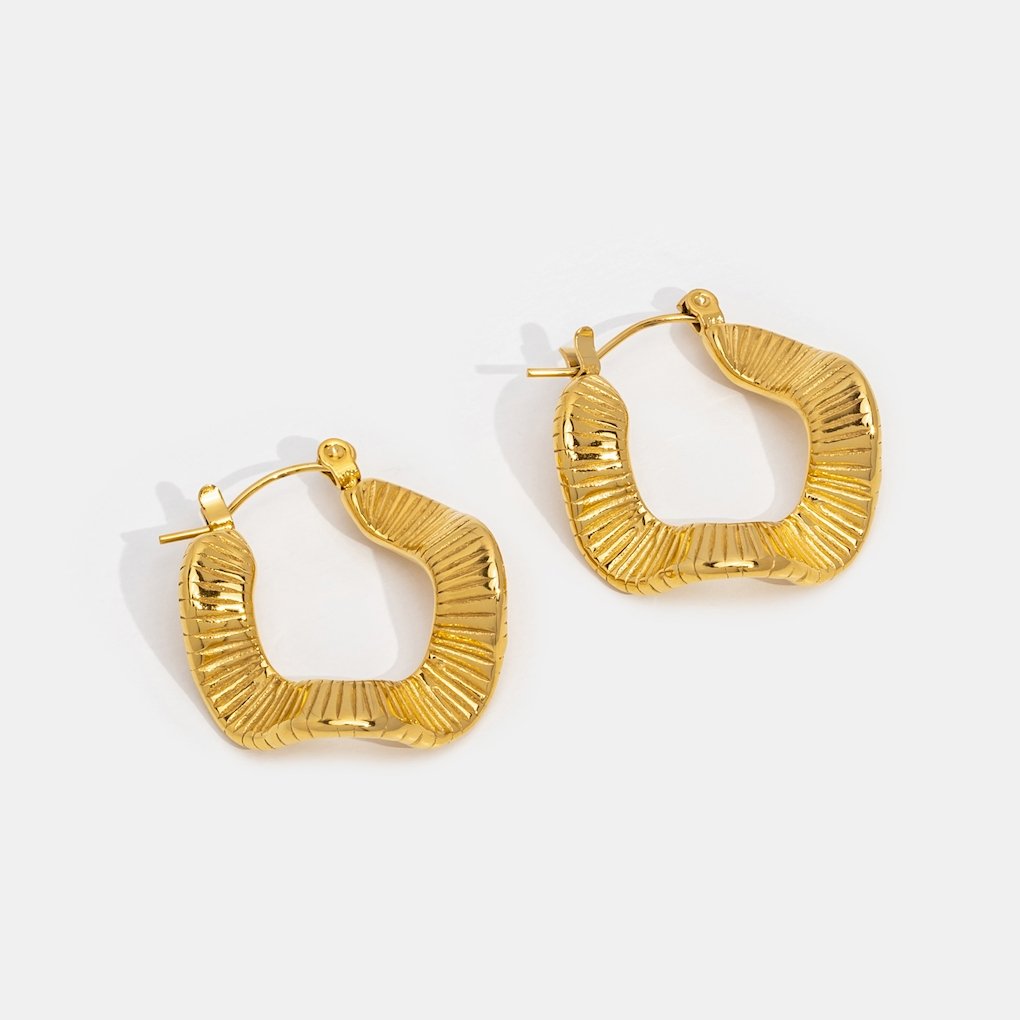Anja – Gold Hoops with Wavy Design