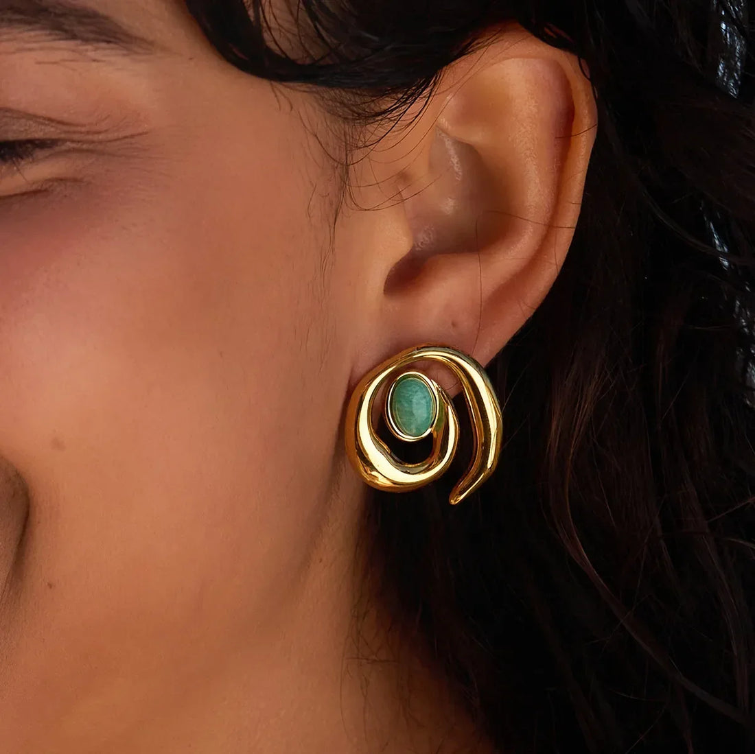 Women's Statement Ear Studs with Swirled Design and Oval Center Stone