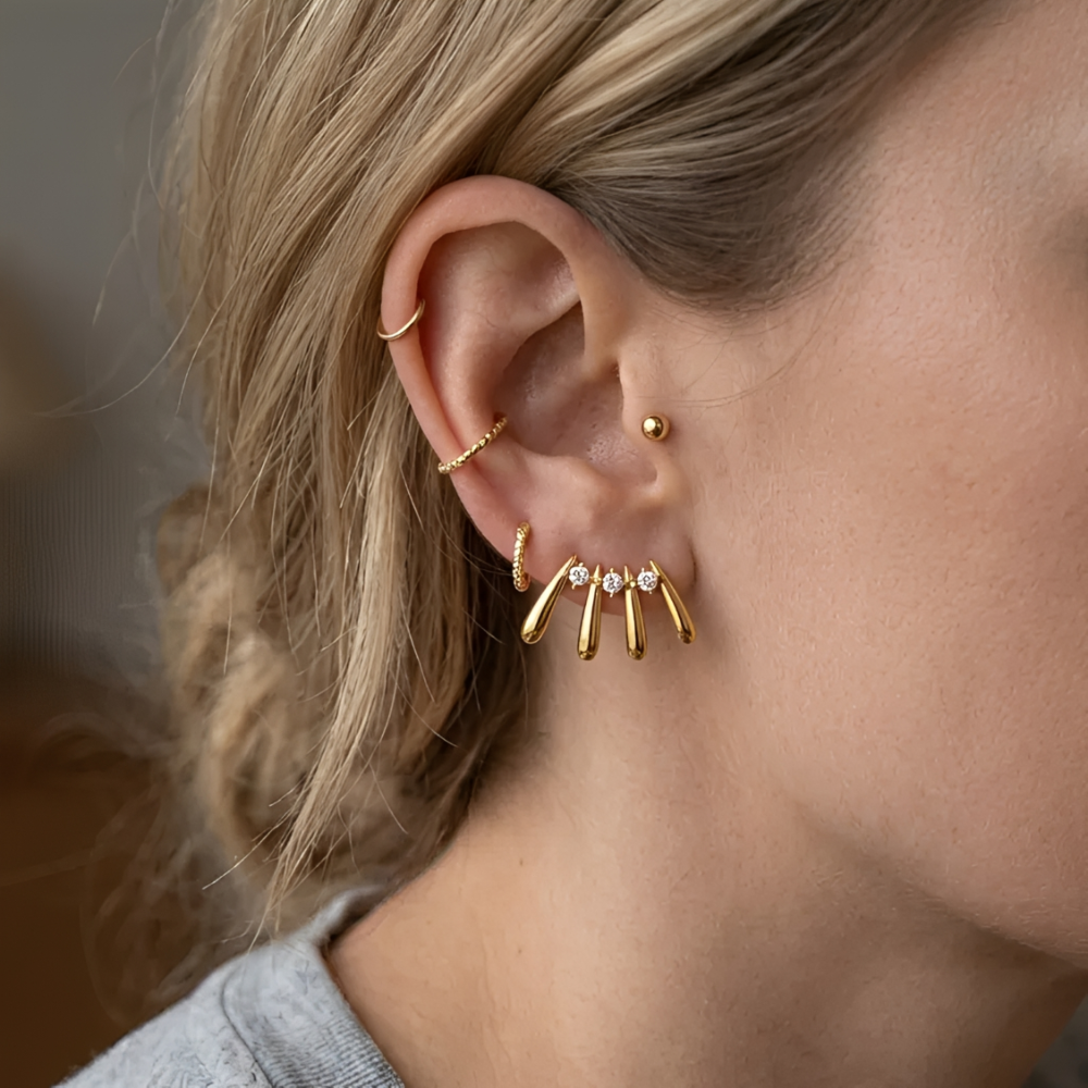 Women's Drop Earrings with Four Drop Pendants and Three Round Stones