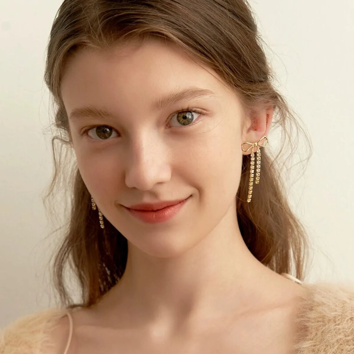 Women's Drop Earrings with Bow Motif and Double Stone Fringes