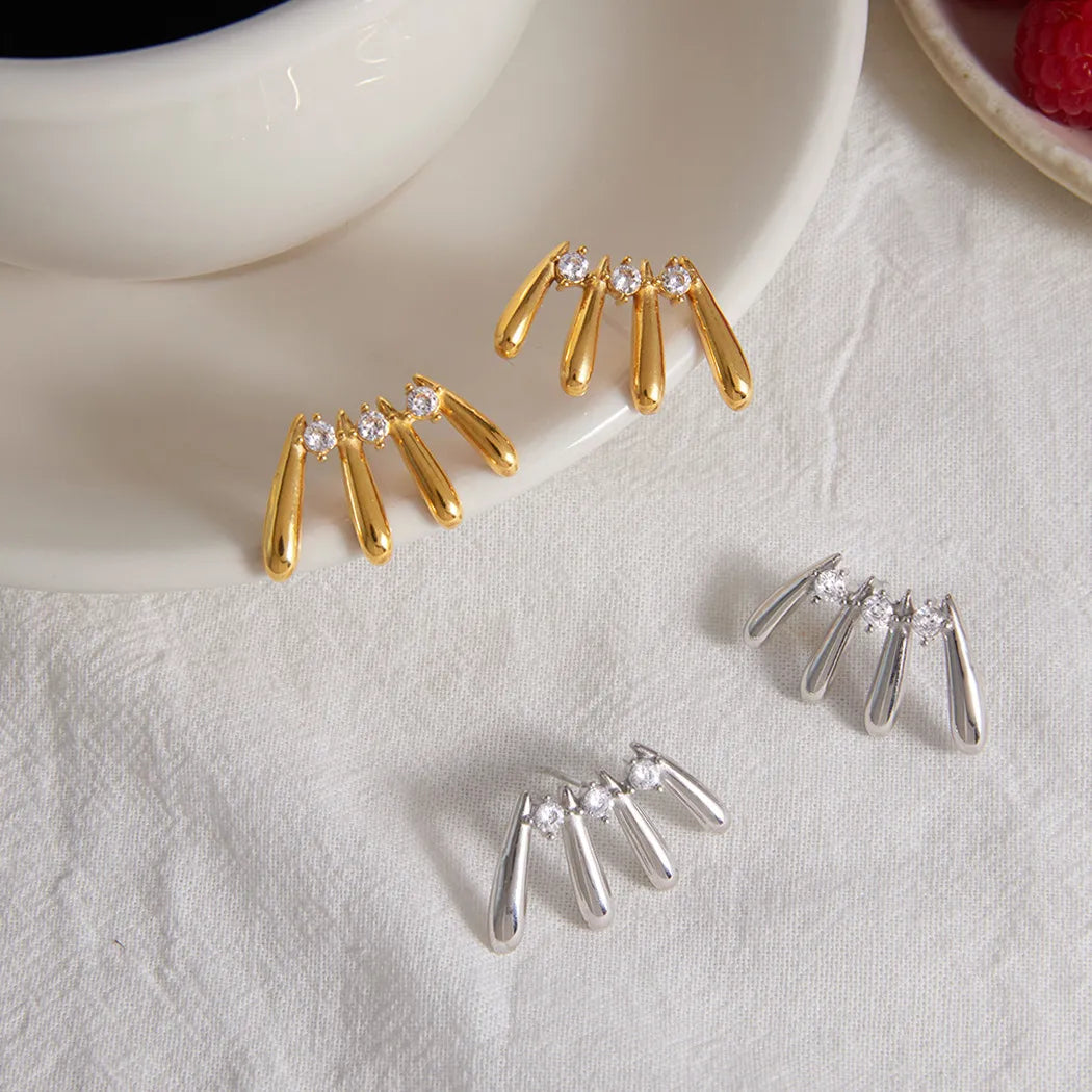 Women's Drop Earrings with Four Drop Pendants and Three Round Stones
