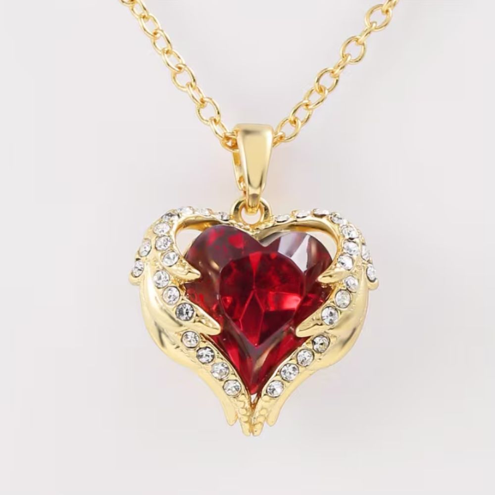 Women’s Heart Pendant Necklace with Wing Frame and Stone Set Details