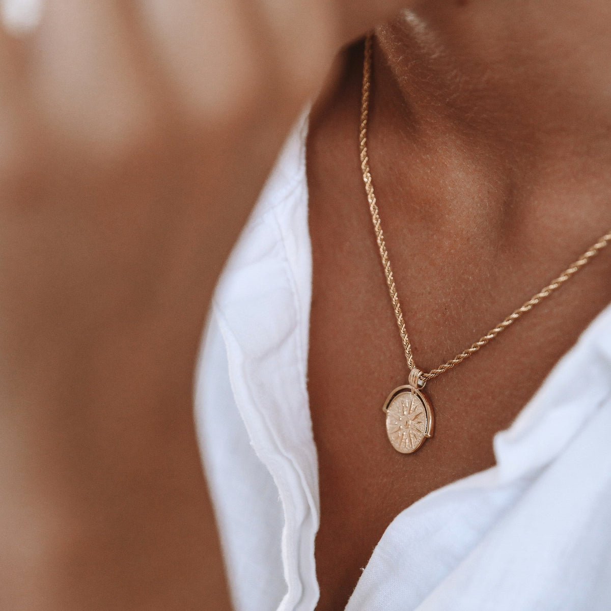 Women's Sun Pendant Necklace with Round Medallion and Ray Motif
