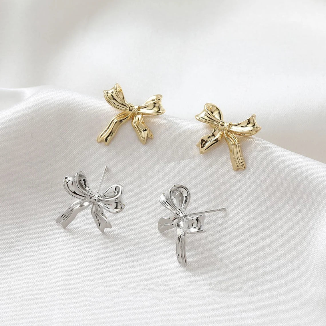 White Gold Stud Earrings with Bow Motif