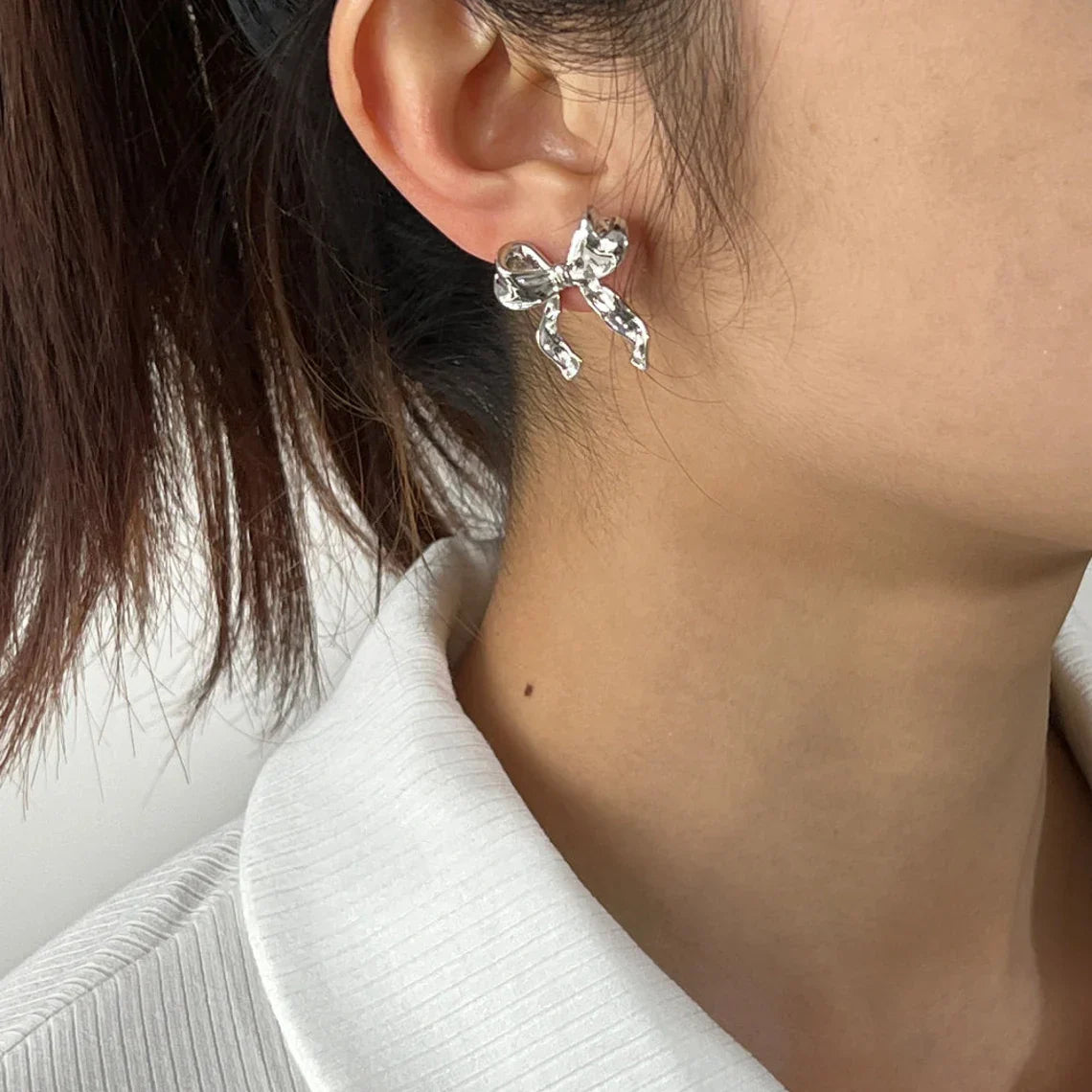 White Gold Stud Earrings with Bow Motif