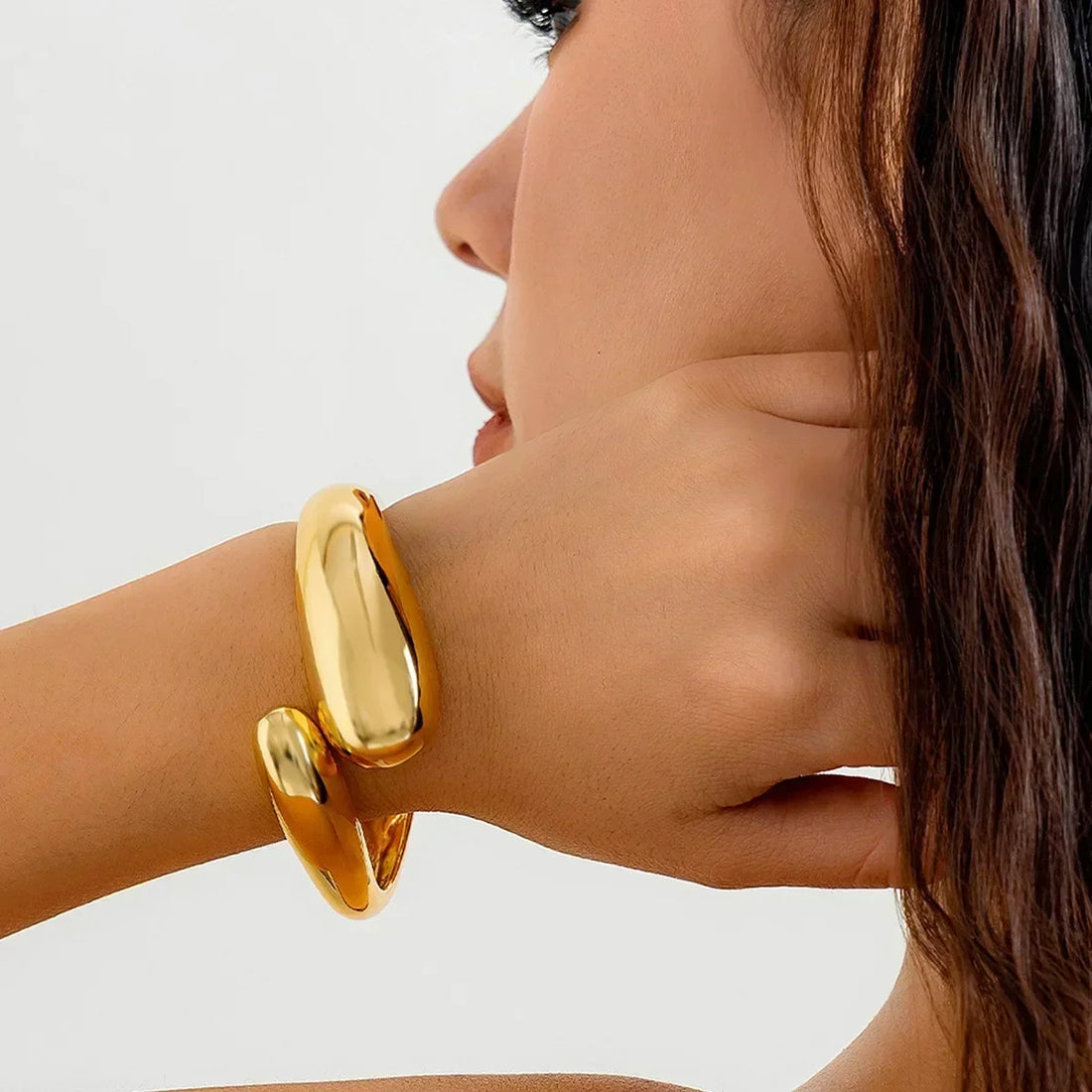 Women’s Open Bracelet with Sculptural Drop Ends and Curved Design