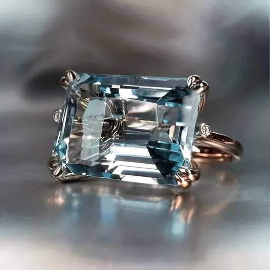 Nadine – Traditional Gold Ring with Blue Zircon