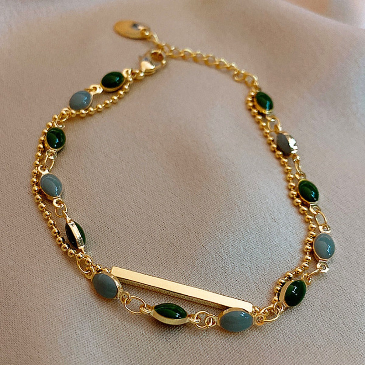 Manon – Bracelet with Green Stone in Gold