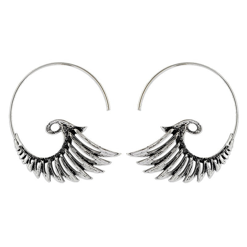 Zia – Golden Earrings with Wing Design