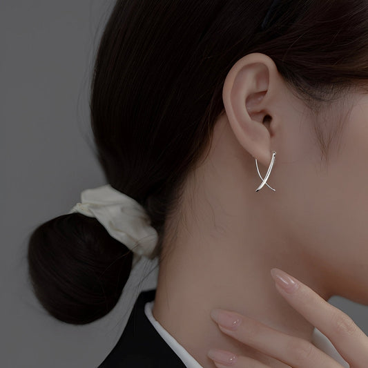 Vanny – Cross earrings in chic gold