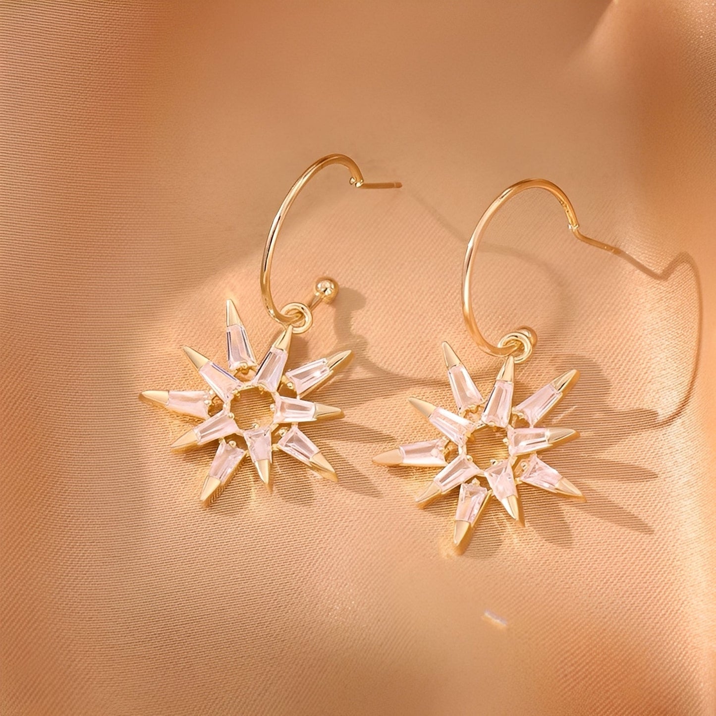 Xienna – Glittering golden star earrings