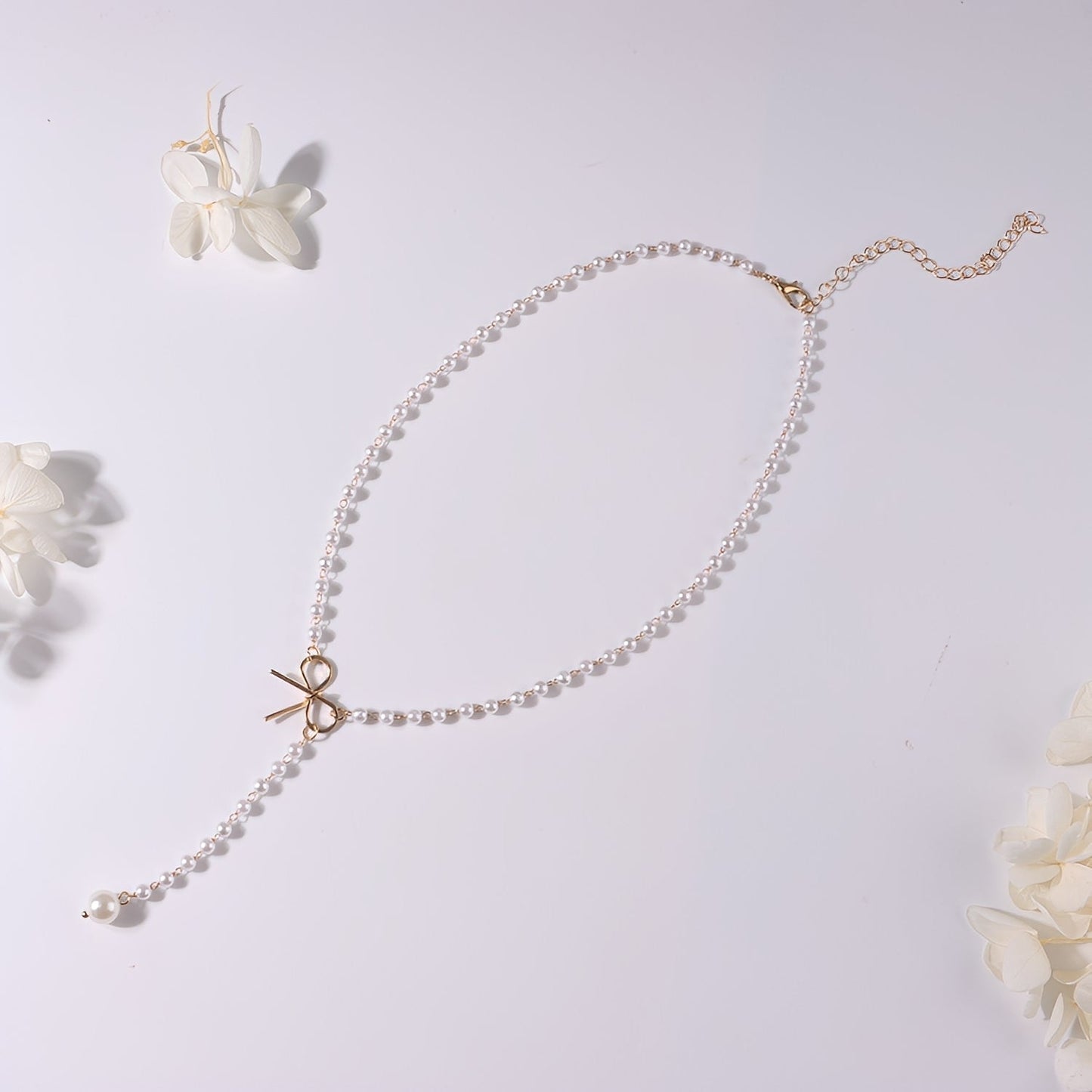 Antoneth – Necklace with Bow-Shaped Pendant and Pearl